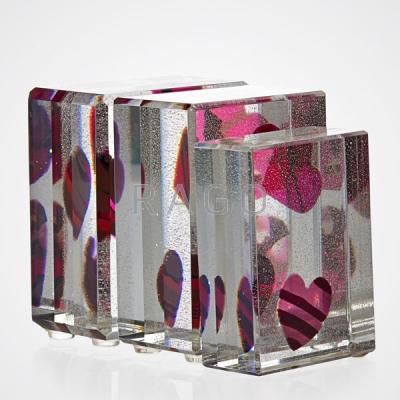 Appraisal: JON KUHN Three glass paperweights Condition Report