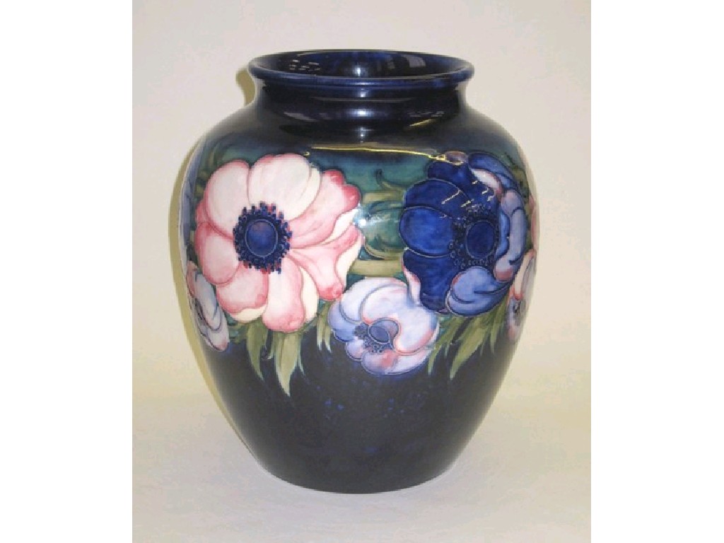 Appraisal: Large Moorcroft 'Anemone' vase on blue ground painted and impressed