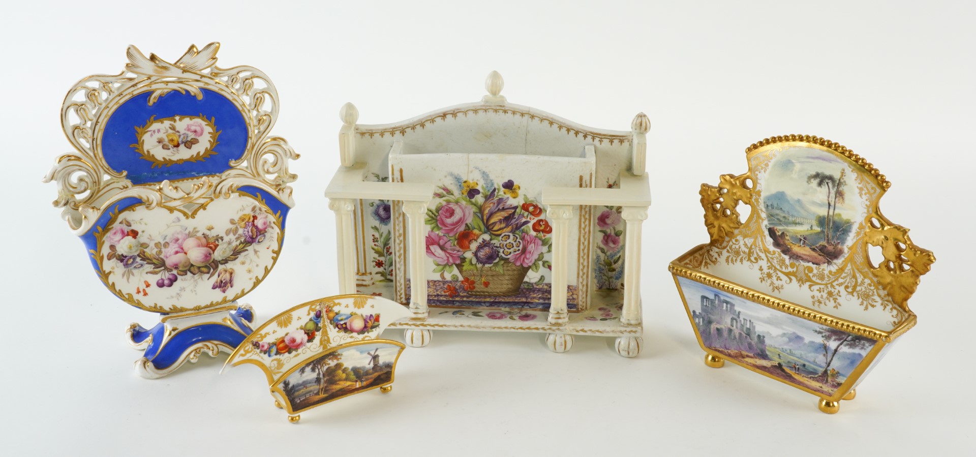 Appraisal: A GROUP OF FOUR ENGLISH PORCELAIN LETTER OR NOTE RACKS