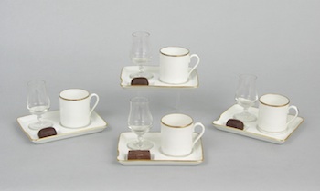 Appraisal: A Set of Four Porcelain Demitasse Cups and Plates A