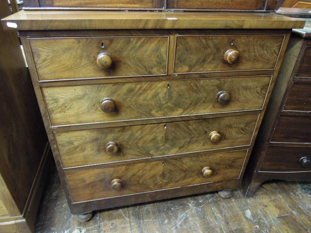 Appraisal: A Victorian mahogany chest fitted with three long and two