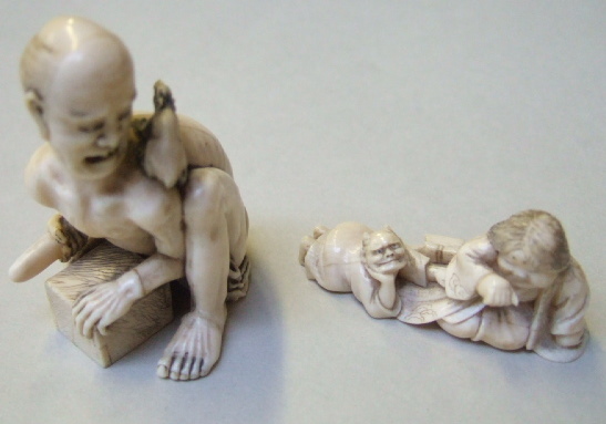 Appraisal: An ivory netsuke of a rat catcher carved crouching over