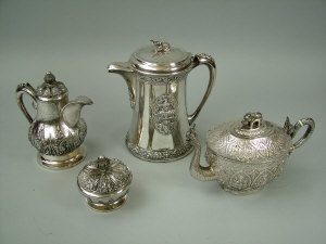 Appraisal: A Middle Eastern white metal teapot and sugar basin with