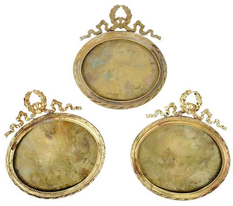 Appraisal: French Oval and Small Round Bronze Frames French th century