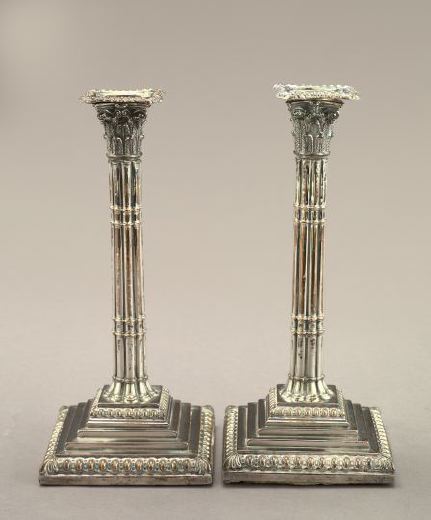 Appraisal: Pair of Sheffield-Plate Ribbed Columnar Candlesticks second quarter th century