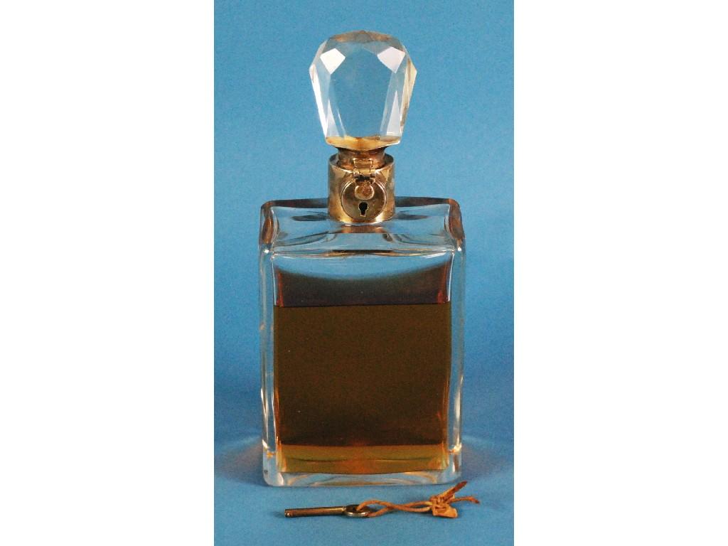 Appraisal: CIRCA 's SILVER AND CUT GLASS LOCKING SPIRIT DECANTER the