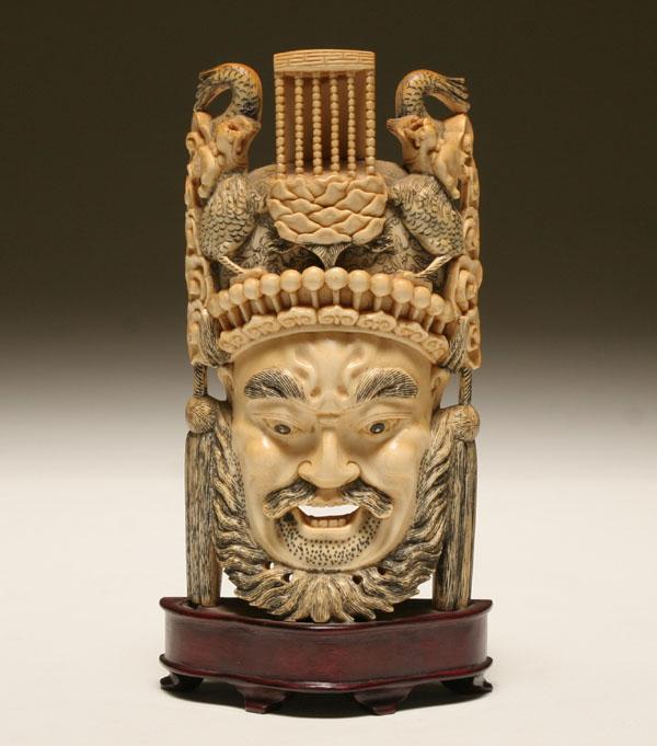 Appraisal: Carved ivory head of a male figure the headpiece decorated