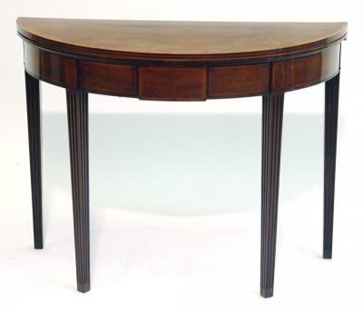 Appraisal: A GEORGE III MAHOGANY FOLDING CARD TABLE of demi lune