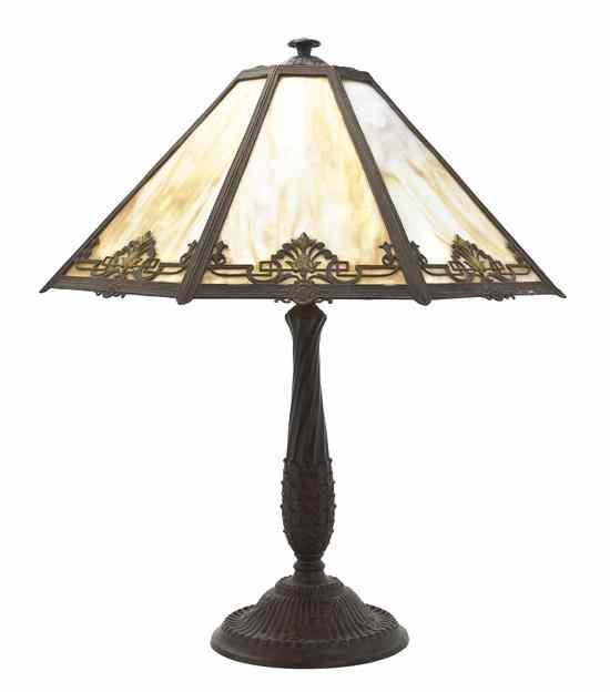 Appraisal: An American Slag Glass Table Lamp having a paneled octagonal