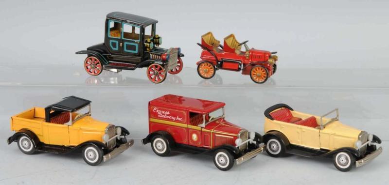 Appraisal: Lot of Tin Old-Timer Friction Car Toys Description Japanese Condition