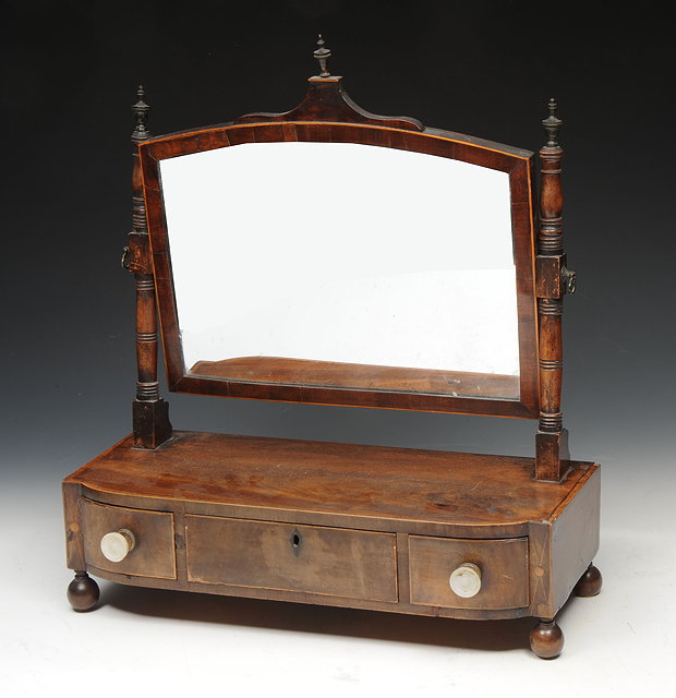 Appraisal: A TH CENTURY MAHOGANY DRESSING TABLE MIRROR with three drawers