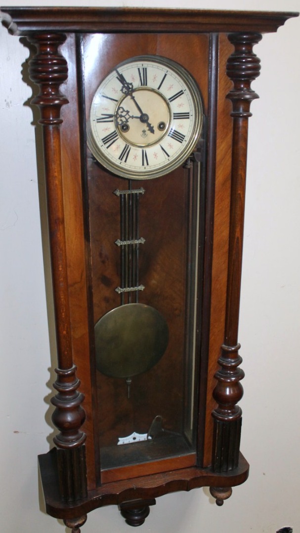 Appraisal: A late thC walnut cased Vienna wall clock by Gustav