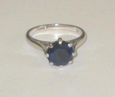 Appraisal: A SOLITAIRE SAPPHIRE RING the round cut stone claw set