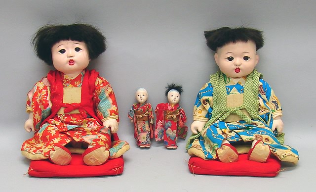 Appraisal: Lot of Japanese dolls Pair of papier mache children dressed