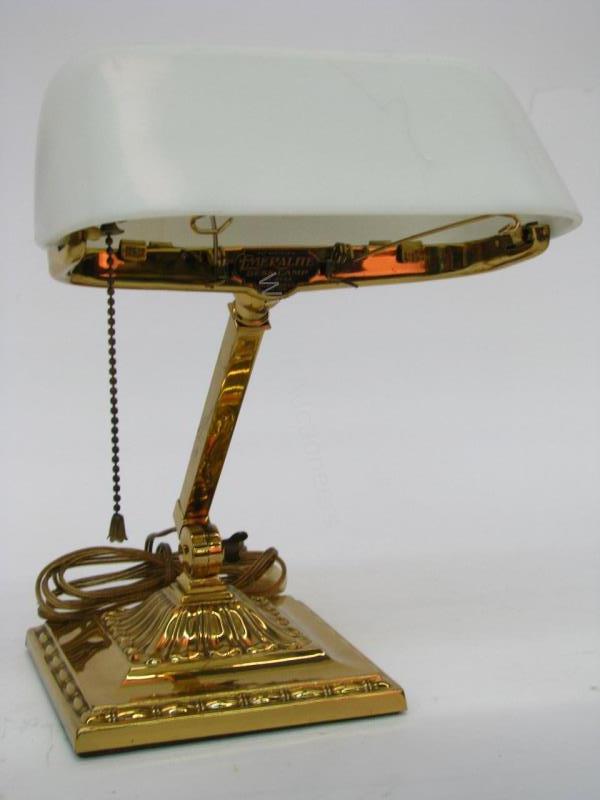 Appraisal: An antique Emeralite lamp model Desk Lamp brass base white