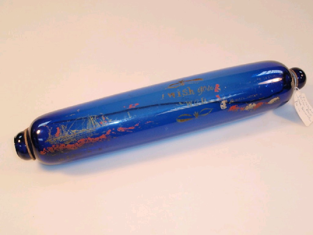 Appraisal: A Victorian Bristol blue glass rolling pin remains of painted