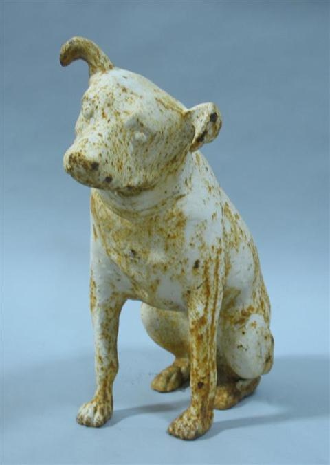 Appraisal: A SMALL WHITE PAINTED CAST IRON MODEL OF A DOG