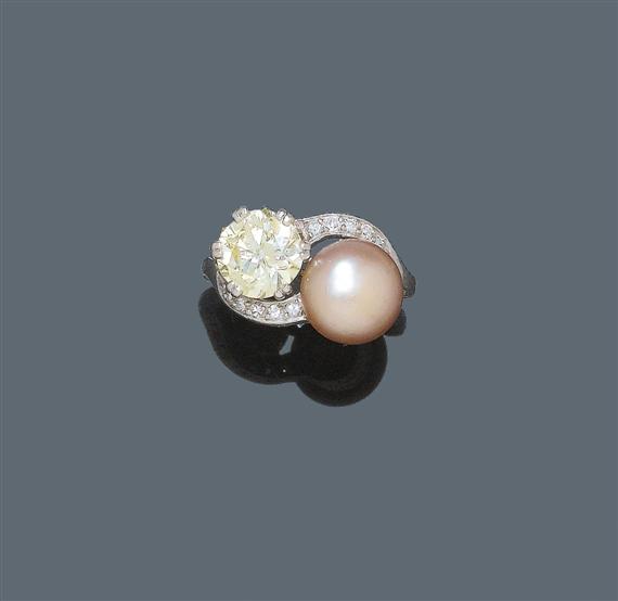 Appraisal: PEARL AND DIAMOND RING ca Platinum Very decorative finely engraved