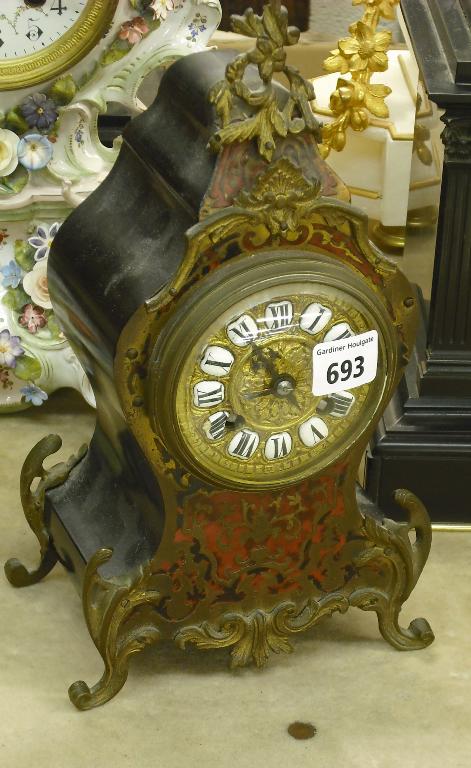 Appraisal: French boulle and ebonised two train mantel timepiece the Marti