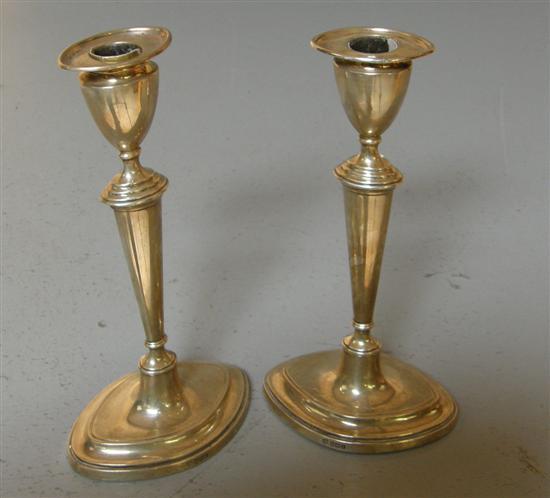 Appraisal: Pair of George V silver candle sticks on oval bases