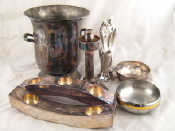 Appraisal: Plated items A champagne bucket two modern shaped candle holders