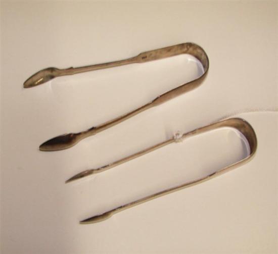 Appraisal: Two Georgian sterling sugar tongs cira - fiddle pattern handles