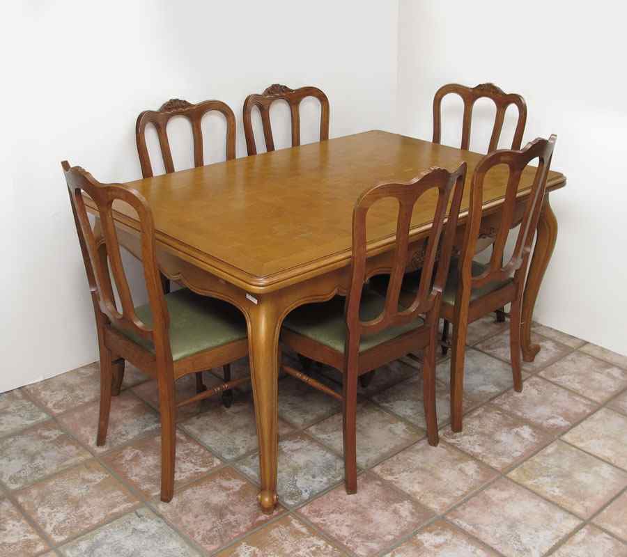 Appraisal: COUNTRY FRENCH PARQUETRY OAK DINING TABLE AND CHAIRS Parquetry top