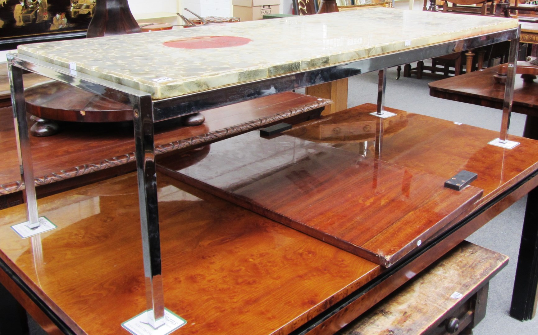 Appraisal: A th century coffee table the rectangular clear resin top