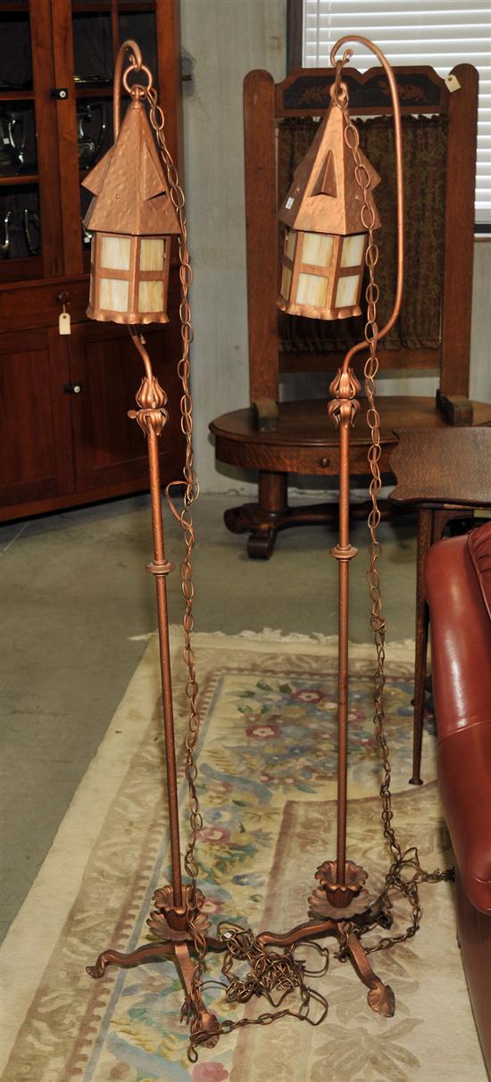 Appraisal: PAIR OF COPPER HANGING LIGHTS Hammered copper lights in the