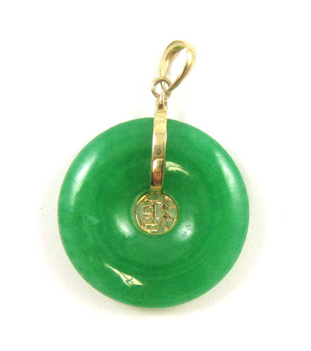 Appraisal: JADE AND FOURTEEN KARAT GOLD PENDANT The Good Luck pendant