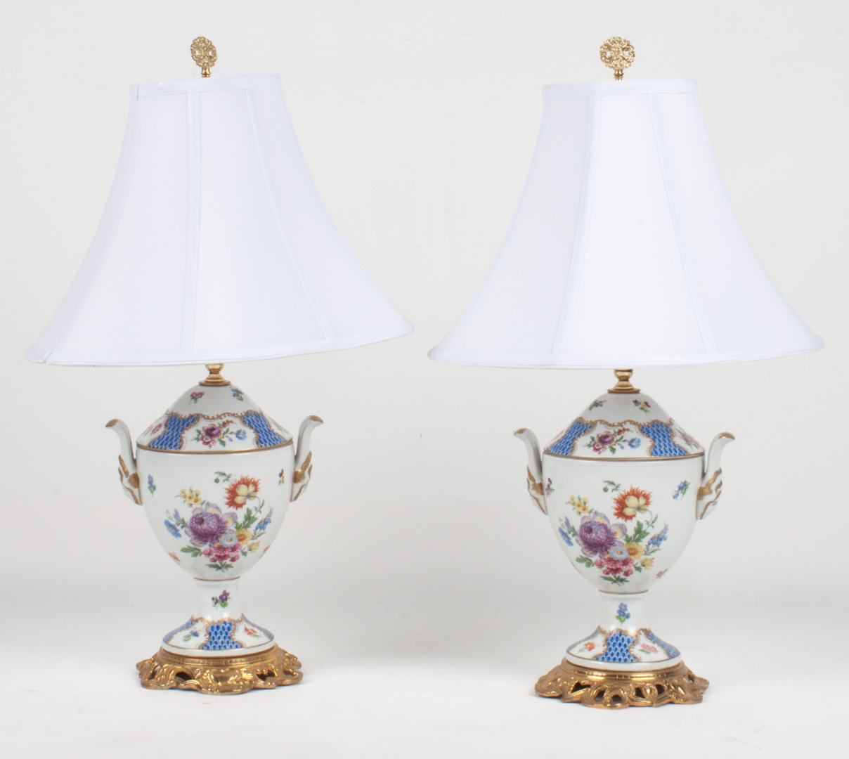 Appraisal: Pair of Dresden style porcelain urn lamps floral and fish