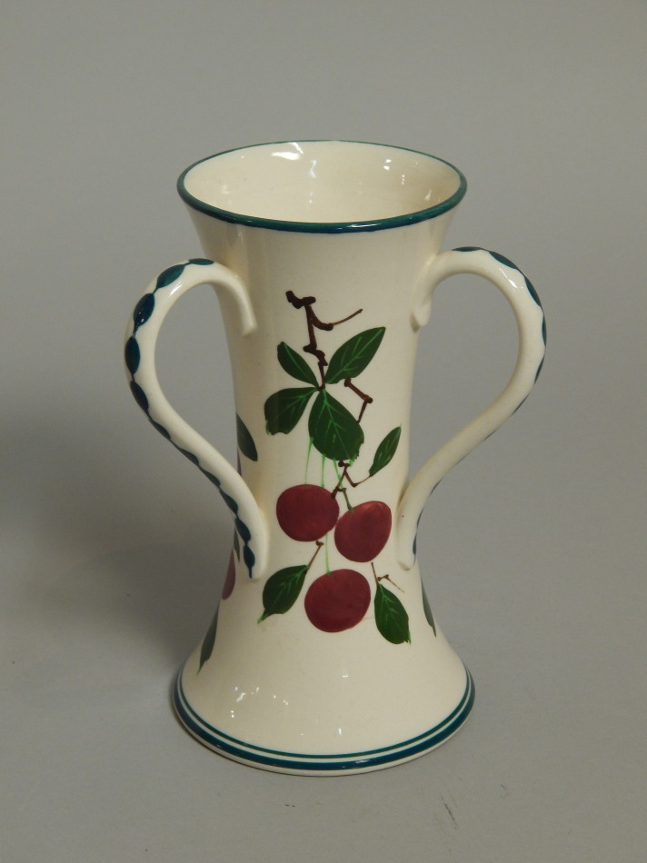 Appraisal: A Wemyss pottery tyg decorated with cherries and leaves painted