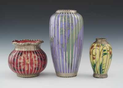 Appraisal: Three Pottery Vases with Silver Overlay th Century All with