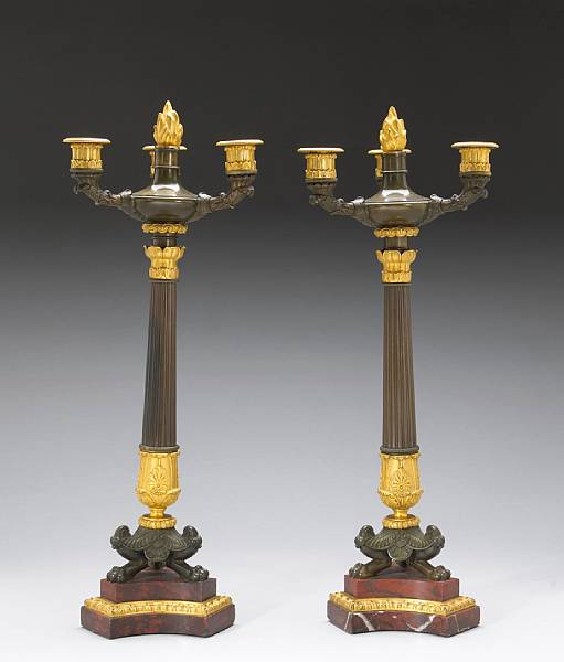 Appraisal: A pair of Charles X patinated gilt bronze and rouge