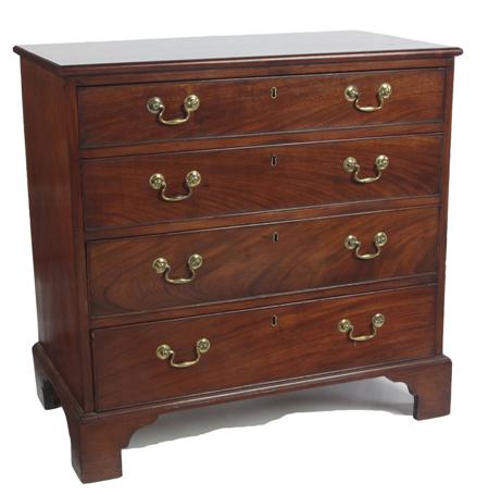 Appraisal: A George III mahogany chest of small proportions the top