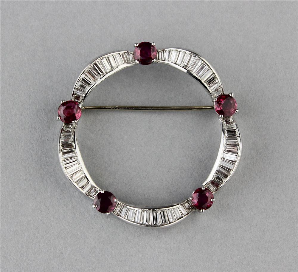 Appraisal: DIAMOND AND RUBY PLATINUM CIRCLE PIN the pin has five