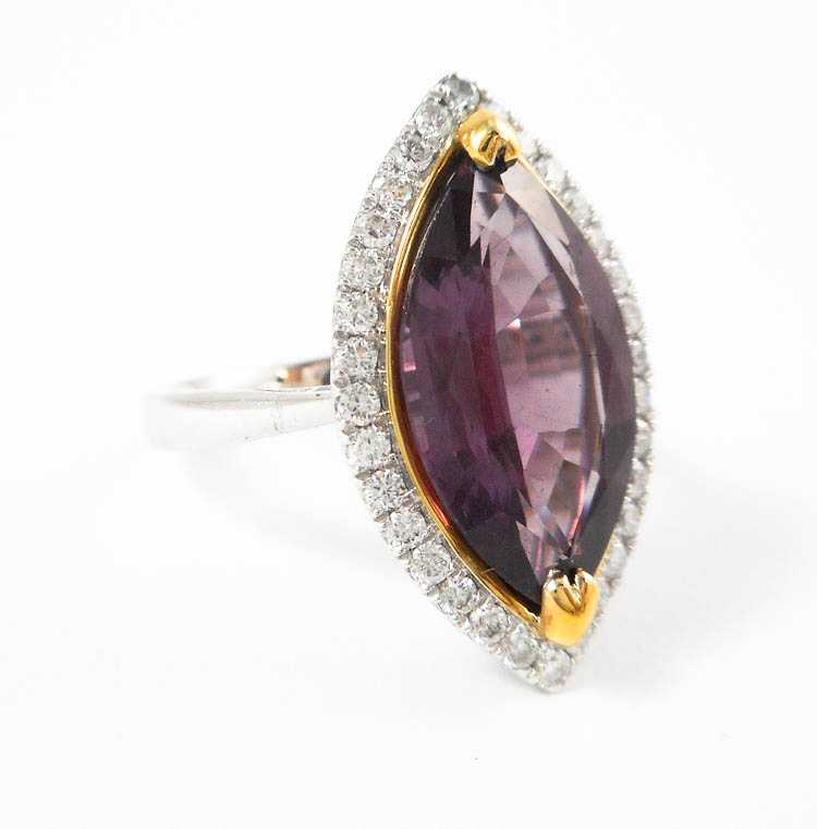 Appraisal: PINK TOURMALINE AND FOURTEEN KARAT GOLD RING The white and