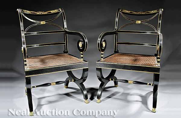 Appraisal: A Pair of Regency-Style Ebonized and Gilt Curule Armchairs late