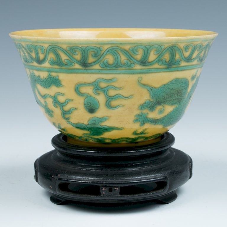 Appraisal: GREEN AND YELLOW ENAMELED 'DRAGON' BOWL GUANGXU The bowl glazed