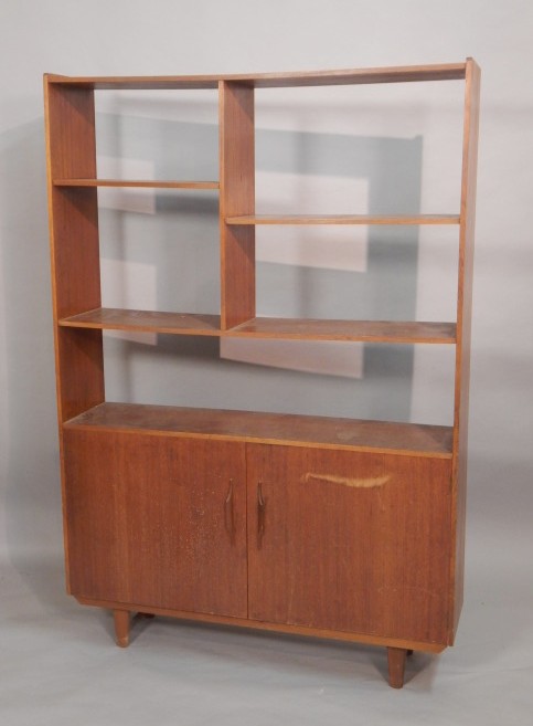 Appraisal: A G-Plan style Retro teak display unit with open shelves