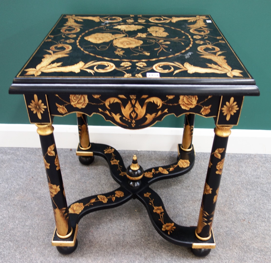 Appraisal: A th century style ebonised parcel gilt floral decorated square