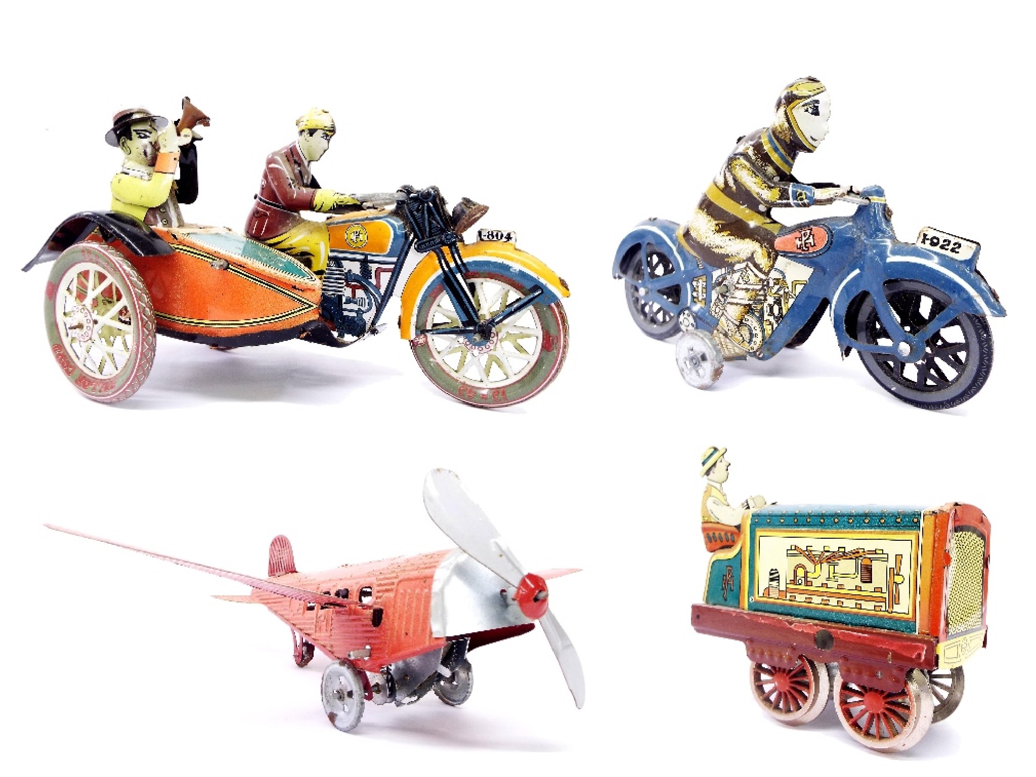 Appraisal: Four various vintage tinplate mechanical wind-up toys to include motorbike