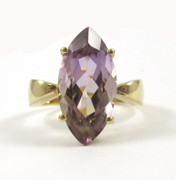 Appraisal: AMETRINE AND FOURTEEN KARAT GOLD RING set with a marquise-cut