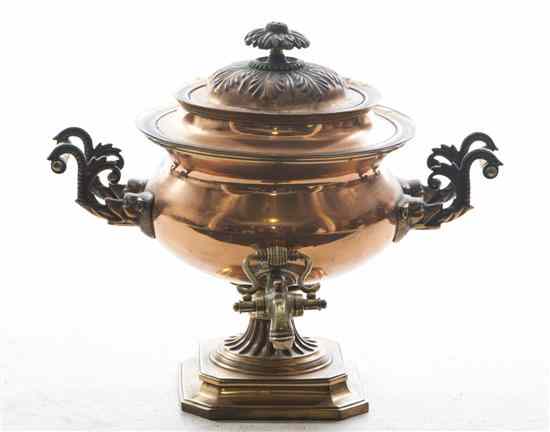 Appraisal: A Copper and Brass Samovar of baluster form having foliate