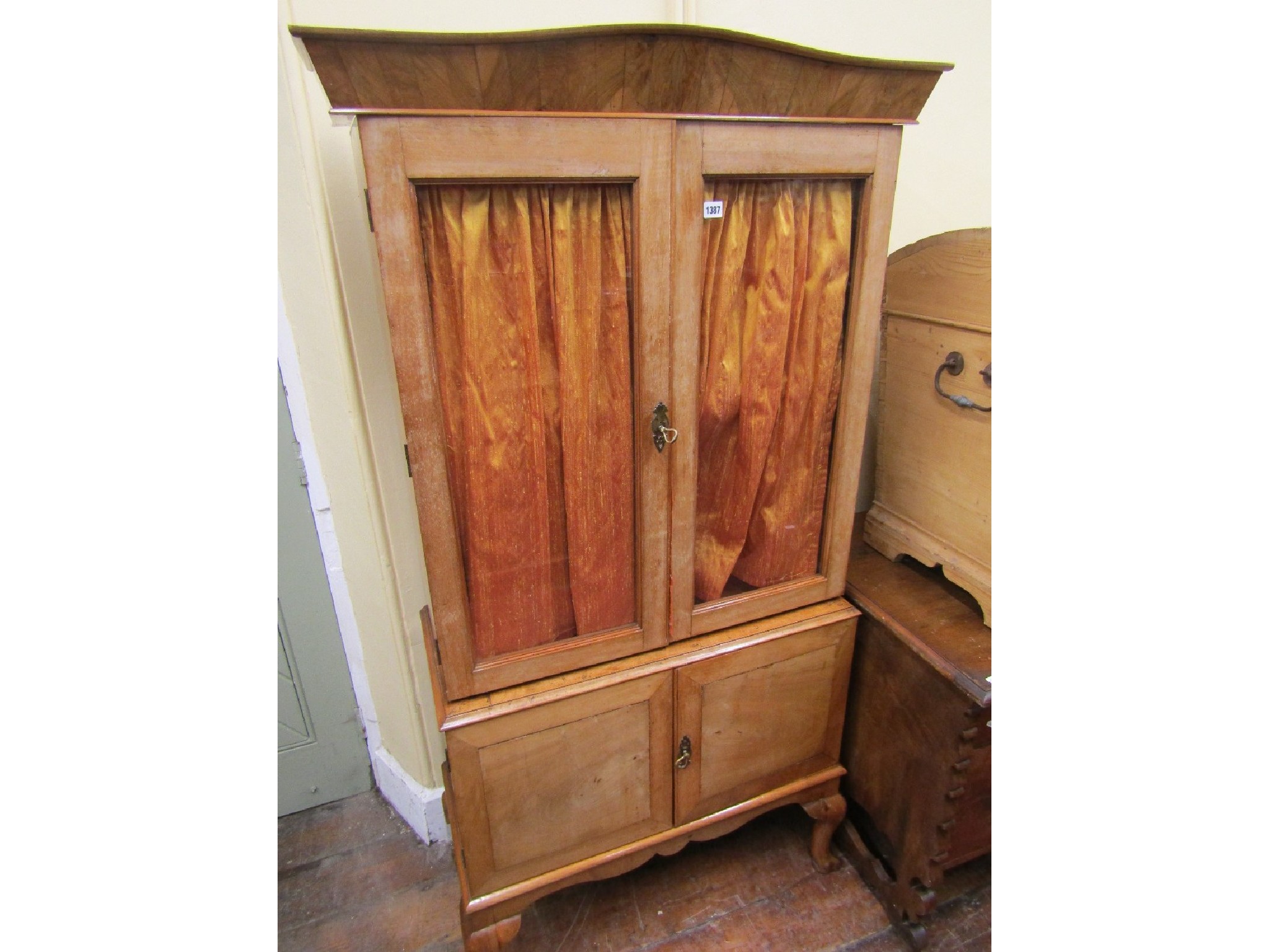 Appraisal: An early th century bleached walnut two tier cabinet the