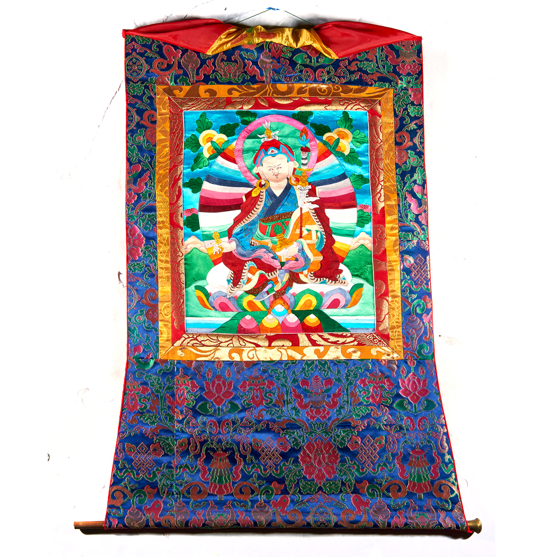 Appraisal: TIBETAN THANGKA Tibetan thangka depicting Padmasambhava with silk mosaic pieces