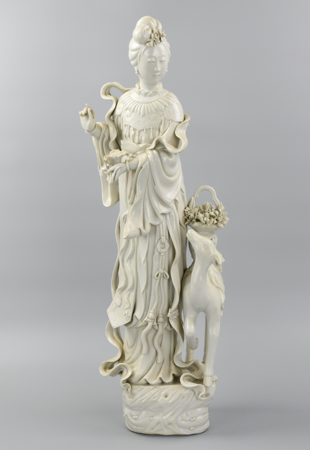 Appraisal: LARGE CHINESE DEHUA GUANYIN W DEER TH C A tall