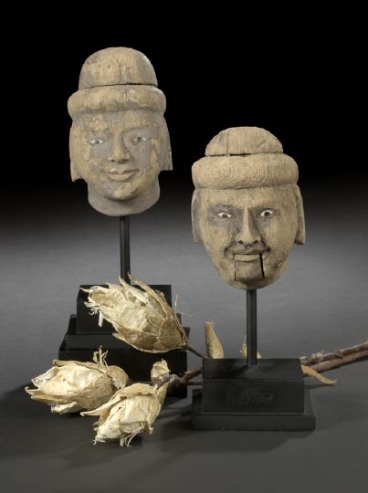 Appraisal: Pair of Indian Carved Heads of Servants th century each