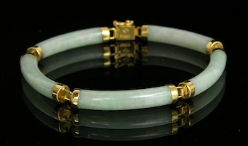 Appraisal: Jade Bracelet with k Gold Fittings k yellow fittings highlight