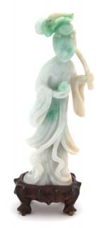 Appraisal: A Carved Apple Green and Celadon Jadeite Figure of Guanyin